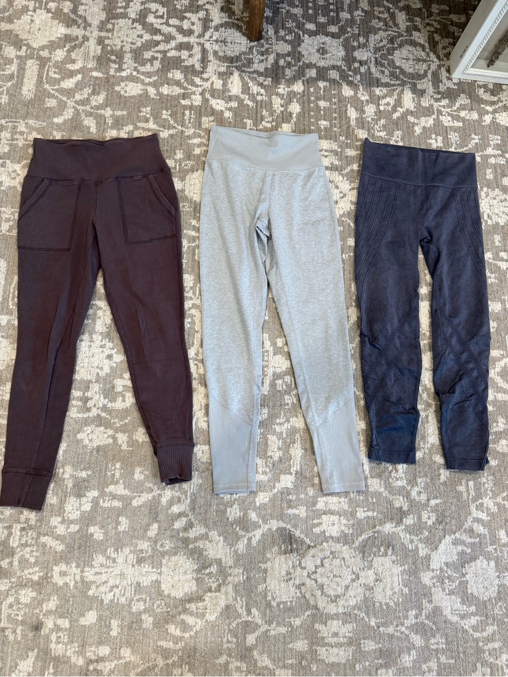 Women’s size small women’s Leggings in Plum, Light Gray, and Navy